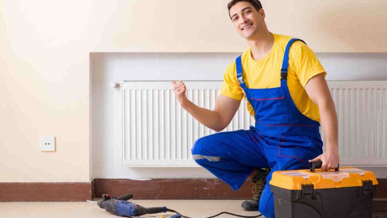 an hvac technician fixing an hvac problem