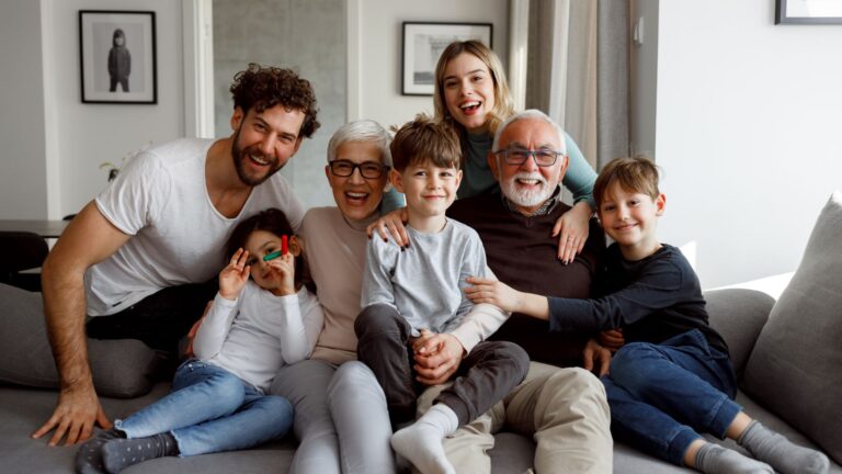 a family of seven on the couch