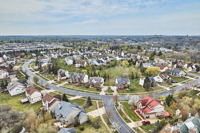 Aerial view of a suburban neighborhood with curved streets