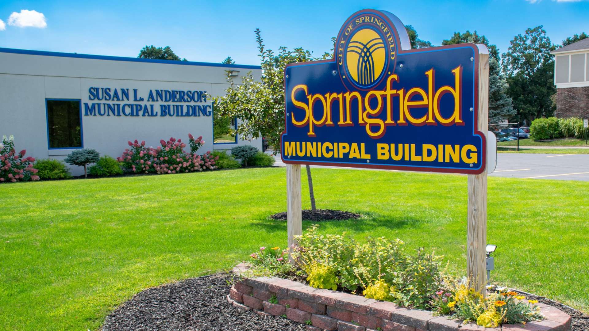 Springfield Municipal Building sign graces a landscaped lawn