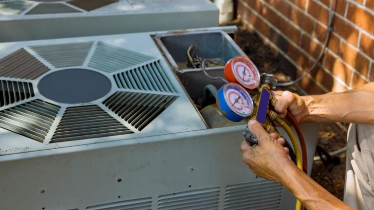 HVAC technician conducting performance check on an air conditioner