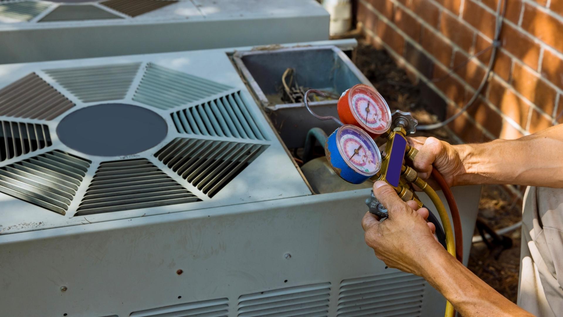 HVAC technician conducting performance check on an air conditioner
